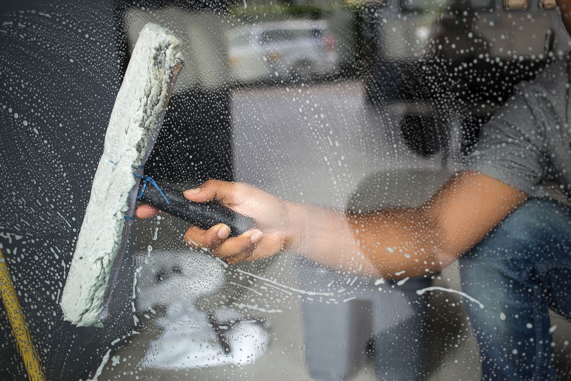 Cleaning windows with a squeegee